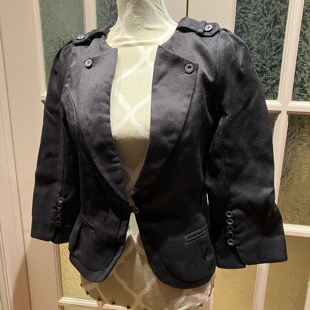 Impressive black vest from Miss Closet